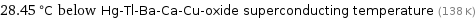 28.45 °C below Hg-Tl-Ba-Ca-Cu-oxide superconducting temperature (138 K)